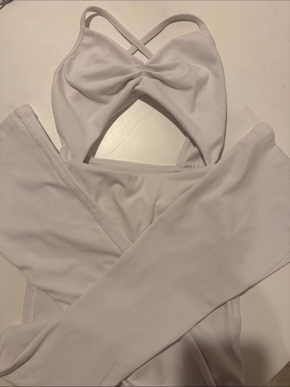 Girls White One-Piece unitard with Twist Front